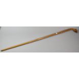 A Turned Wooden Novelty Walking Cane with Dragon Head Handle, 107cm Long