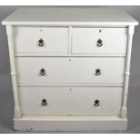 A Cream Painted Chest of Two Short and Two Long Drawers with Turned Pilasters, 91cm wide