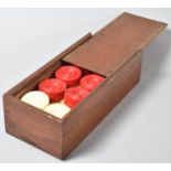 An Edwardian Mahogany Rectangular Box with Sliding Lid Containing Various Draughts Pieces