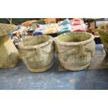 A Pair of Circular Reconstituted Stone Patio Planters with Moulded Grape Decoration in Relief,