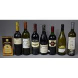 A Collection of Seven Bottles of Various Red and White Wines Together with a Bottle of 25cl Bottle