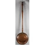 A 19th Century Copper Bed Warming Pan with Turned Wooden Handle