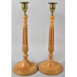 A Pair of Turned Wooden Brass Mounted Candle Sticks with Reeded Supports, 38cm high