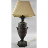 A Bronze Effect Metal Table Lamp in the Form of a Bronze Vase, The Body Decorated in Relief with