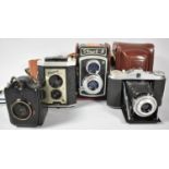 A Collection of Four Vintage Cameras