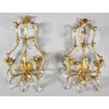 A Pair of Gilt Metal Two Branch Wall Hanging Candelabra with Clear Shaped Crystal Droppers, Each