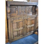 An Early Oak Court Cupboard with Carved Panelled Doors and Top Rail, 143cm wide