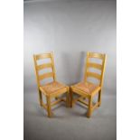 A Pair of Modern Rush Seated Ladder Back Chairs