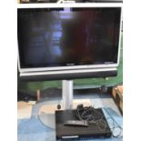 A Technisat HD Vision 32" TV with Stand (no Remote) Together with a Studio Pro DVD Player with