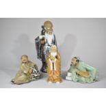 A Collection of Four Various Chinese Mud Men to Include Large Glazed Shou Example, 29cnm high
