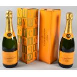 Two Bottles of Veuve Clicquot Champagne in Cardboard Cartons, One Inscribed Purchased Pont L'Eveque,