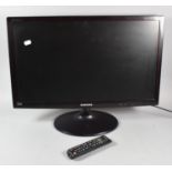 A Samsung 24" TV Syncmaster T24B350, with Remote