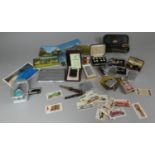 A Collection of Curios to Include Cigarette Lighters, Small Compass, Wrist Watch, Cufflinks, Stud