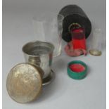 An Edwardian Cased Medicine Glass and Minim Measure Together with a Collapsable Measure Plated Cup