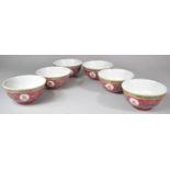 A Collection of Six Chinese Rice Bowls on Pink Ground