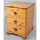 A Single Modern Pine Three Drawer Bedside Chest