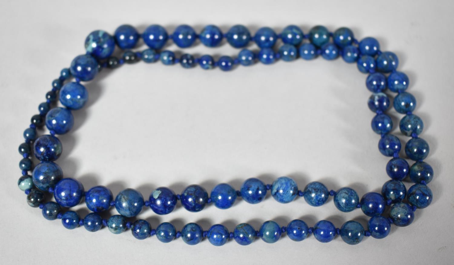 A Graduated String of Lapis Lazuli Beads, 88cm Long