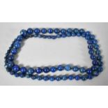 A Graduated String of Lapis Lazuli Beads, 88cm Long