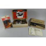 A Prima Stove, Long Neck Periscope and Electric Car Kettle, All in Original Boxes