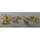 Four Pairs of Yellow Metal Earrings and a Jewelled Pendant