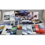 A Collection of Various Car Brochures, Motorcycle Brochures etc