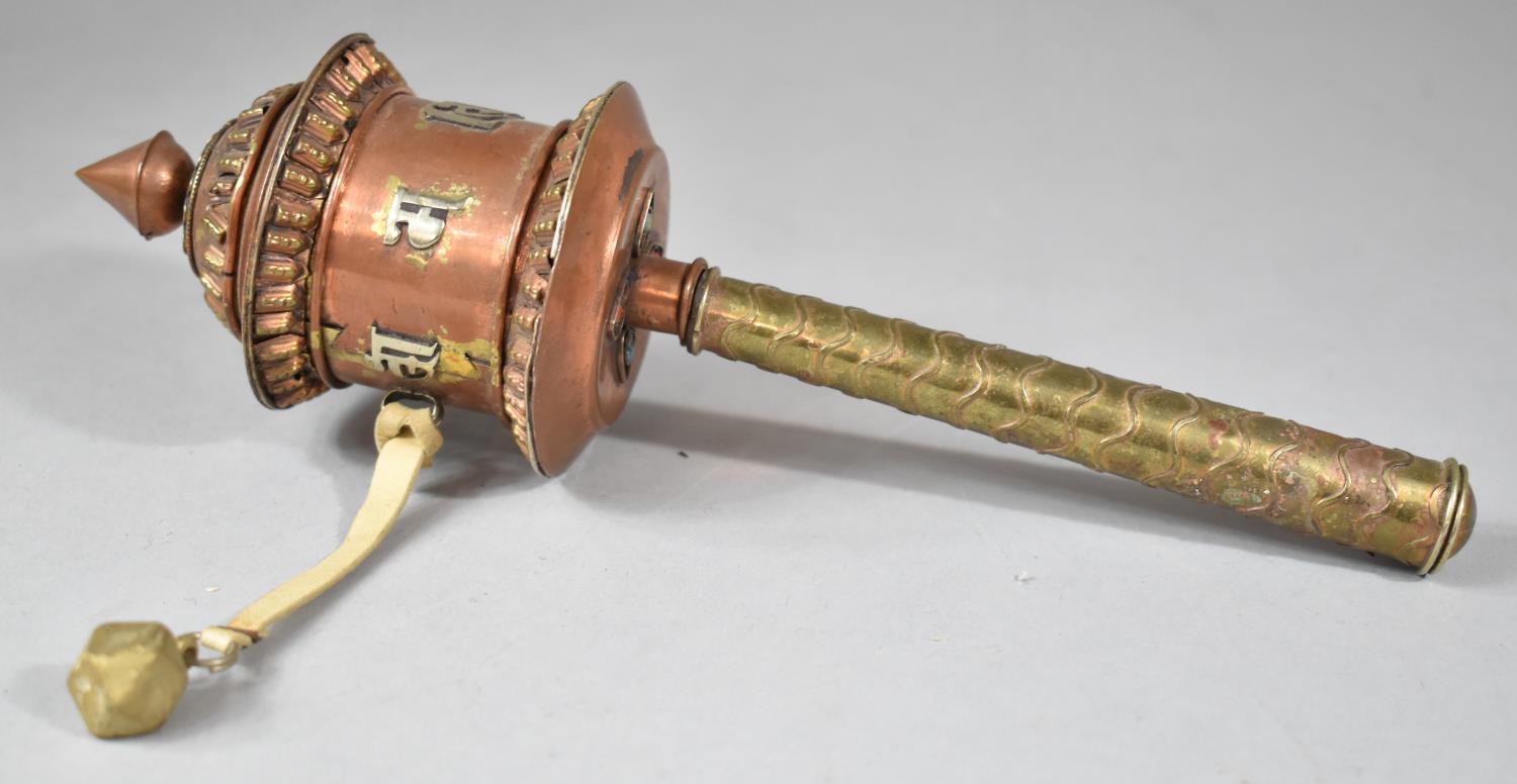 A Mixed Metal and Jewelled North Indian or Burmese Prayer Wheel, 23cm long