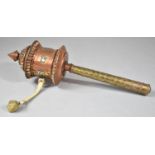 A Mixed Metal and Jewelled North Indian or Burmese Prayer Wheel, 23cm long