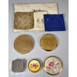 A Collection of Four Vintage Powder Compacts