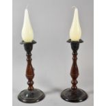 A Pair of Indian Turned Metal Candle Sticks, Each 24cm High