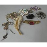 A Collection of Costume Jewellery to Include Gilt Metal Brooches to Include Amethyst, Faux Pearl,
