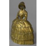 A Brass Bell in the Form of Crinoline Lady, 13cm high