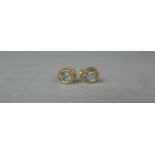 A Pair of 9ct Gold and Aquamarine Stud Earrings