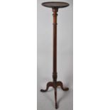 A Mahogany Torchere Stand on Tripod Base with Turned Reeded Support and Circular Top, 124cm high