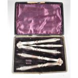 A Late 19th/Early 20th Century Cased Pair of Silver Plated Nutcrackers and Picks, One Pick Missing