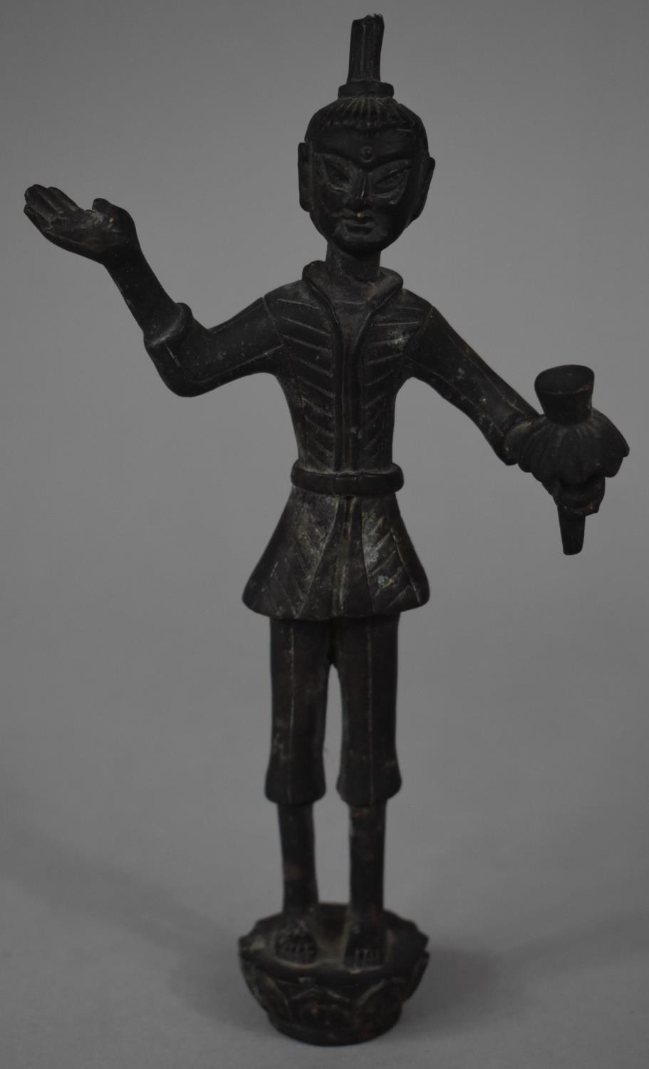 An Early Chinese Bronze Figure of Noble or Deity Holding Flower and with Palm Held Upwards, Lotus