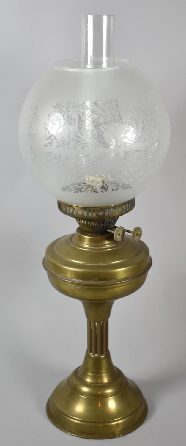 A Vintage Brass Oil Lamp with Acid Etched Globe and Plain Chimney, 58cm high