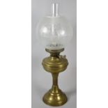 A Vintage Brass Oil Lamp with Acid Etched Globe and Plain Chimney, 58cm high