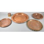 A Collection of Four Copper Chargers and Bowls Together with Cylindrical Lidded Pot