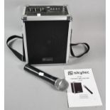 A Skytec ST030 Portable Amplifier with Microphone