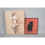 A Framed Print on Canvas and a Print of a Black Cat