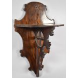 An Edwardian Rosewood Wall Sconce with Pierced Support, 34cm high