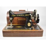 A Vintage Cased Singer Sewing Machine