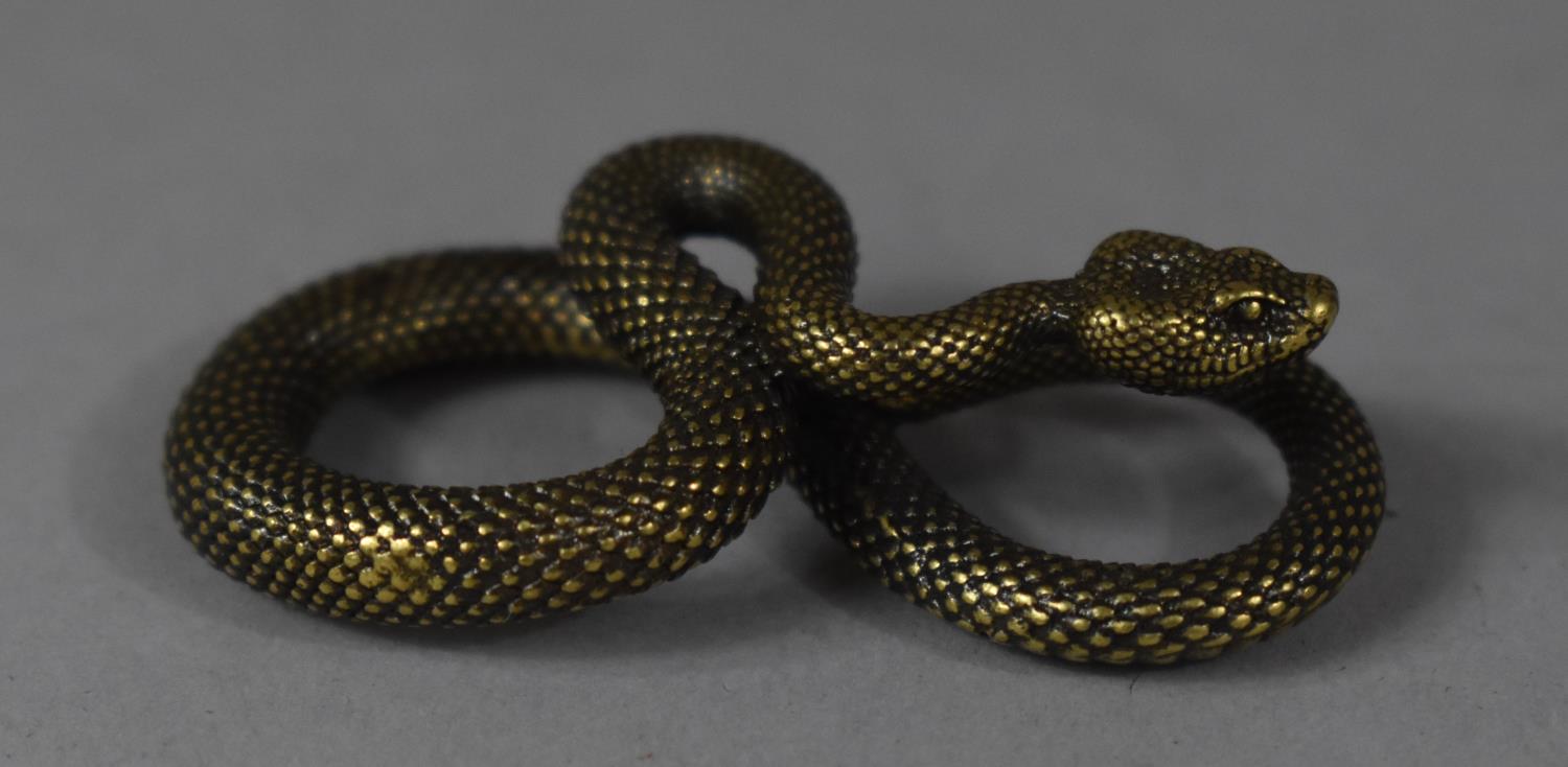 A Small Bronze Study of a Cobra, 5 cm wide