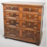 A Mid 20th Century Oak Chest of Four Graduated Long Drawers with Fielded Panels, Metal Drop Handles,