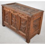 A Nice Quality Carved and Panelled Oak Coffer Chest, The Hinged Lid Decorated with Starburst and