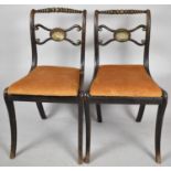 A Pair of 19th Century Side Chairs with Brass Shell Mounts to Backrests