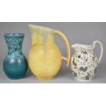 A Beswick Yellow Glazed Jug, Wedgwood Lustre Jug and a Blue Glazed Vase