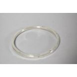 A Silver Slave Bangle, Birmingham 1922 by Adie & Lovekin, 18.5cm diameter