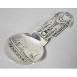 A Danish White Metal Tea Caddy Spoon Decorated in Relief, 10cm high, Stamped with Twin Tower and