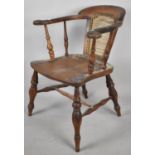 A Late 19th/Early 20th Century Elm Seated Smokers Bow Armchair, Formerly with Cane Back but Now
